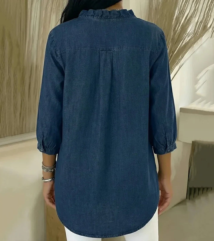 Adele | Fluid denim blouse with V-neck and ruffles